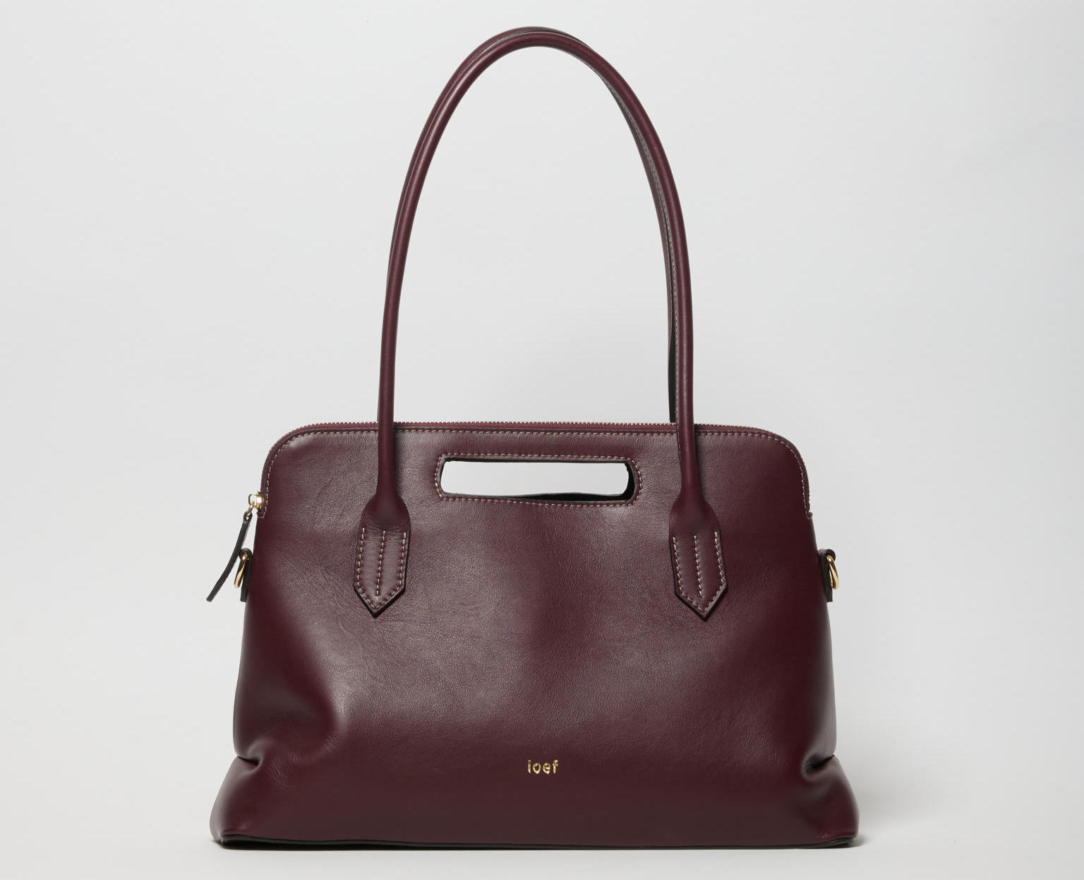 Borsa IOEF in pelle liscia dalla superficie uniforme e pulita